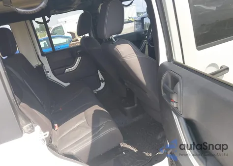 2013 Jeep Wrangler Unlimited Sahara z USA, uszkodzony, nr VIN 1C4BJWEG9DL693671